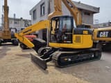 2018 Komatsu PC128US mini excavator, front three-quarter view