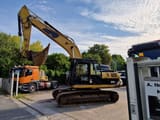 2007 Caterpillar 324D crawler excavator, side profile view