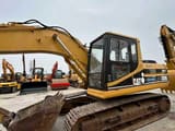 2000 Caterpillar 320B crawler excavator, side view