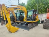 2023 Komatsu PC60 crawler excavator, front three-quarter view