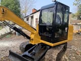 2011 Caterpillar 306E crawler excavator, side view