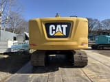 2018 Caterpillar 320-07A crawler excavator, rear view
