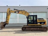 2012 Caterpillar 319D L crawler excavator, side view