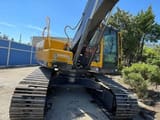 2023 Volvo EC210B crawler excavator, rear three-quarter view