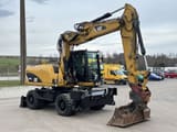 2012 Caterpillar M315D wheel excavator, side view