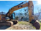 2014 Caterpillar 320E crawler excavator, side profile view