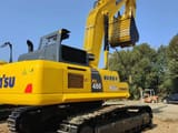 2023 Komatsu PC450 crawler excavator, rear three-quarter view