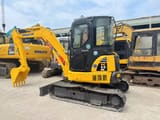 2018 Komatsu PC55MR mini excavator, three-quarter view