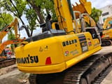 2024 Komatsu PC200 crawler excavator, rear three-quarter view