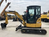 2024 Caterpillar 303.5E mini excavator, side profile view