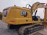 2024 Caterpillar 330GC crawler excavator, rear three-quarter view