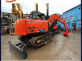 2016 Hitachi Zaxis 60 crawler excavator, rear three-quarter view