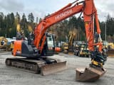 Hitachi Zaxis 135 crawler excavator, side view