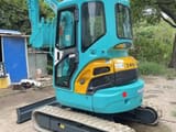 2022 Kubota U35-3 mini excavator, front three-quarter view