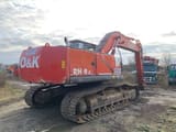 2003 O&K RH9.5 crawler excavator, rear three-quarter view