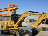 2024 Caterpillar 305.5E2 mini excavator, side profile view