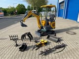 Berger Kraus BK1250JS mini excavator with attachments, side view