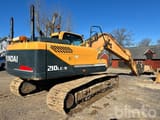 2011 Hyundai R210LC-9 crawler excavator rear three-quarter view