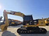 2023 Caterpillar 323DL excavator side view