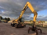 2012 Caterpillar M318 MH wheel excavator, side view