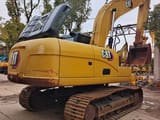 2024 Caterpillar 320GX crawler excavator, rear three-quarter view