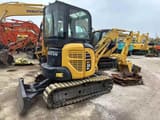 2011 Komatsu PC35MR mini excavator, rear three-quarter view