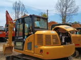 2023 Komatsu PC70 crawler excavator, rear three-quarter view
