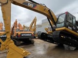 2016 Caterpillar 320D paletli ekskavatör, yandan profil görünümü