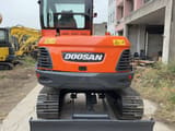 Doosan DX60-9C mini excavator, rear view