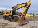 2018 Caterpillar M315F wheel excavator, side view