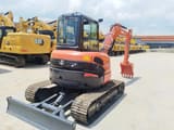 2022 Kubota U55-4 mini excavator, front three-quarter view
