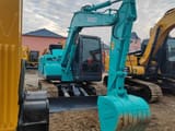2020 Kobelco SK75 mini excavator front three-quarter view