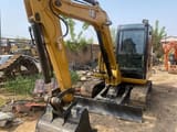 Caterpillar 306D mini excavator, front three-quarter view
