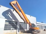 2012 Doosan DX420LC demolition excavator, side view with high-reach boom
