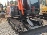 Hitachi ZX70 crawler excavator, front three-quarter view