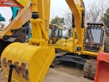 2025 Komatsu PC210LC-7 crawler excavator, front three-quarter view