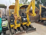 2023 Komatsu PC18MR-3 mini excavator, front three-quarter view