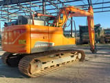 Doosan DX140LC-5 crawler excavator, rear three-quarter view