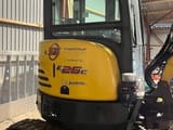 2020 New Holland E26C mini excavator rear three-quarter view