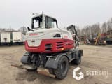2018 Takeuchi TB295W wheel excavator, rear three-quarter view
