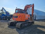 2021 Doosan DX140LCR-5 crawler excavator, rear three-quarter view