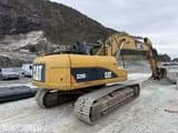 Escavatore cingolato Caterpillar 320DL del 2011, vista posteriore tre quarti