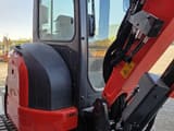 2021 Kubota U36-4 mini excavator, side view of cab and boom