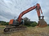 2012 Hitachi ZX225USLC-3 crawler excavator, side view
