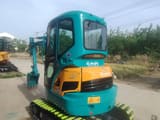 2023 Kubota U25 mini excavator, rear three-quarter view