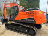 2022 Doosan DX225LC-9C crawler excavator, rear three-quarter view