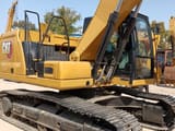 2023 Caterpillar 320GC crawler excavator, side view