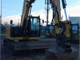 2021 Caterpillar 310-07 crawler excavator, front three-quarter view