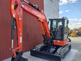 2022 Kubota KX060-5 mini excavator, front three-quarter view