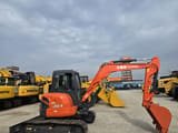 2024 Kubota U55-4 mini excavator, side profile view